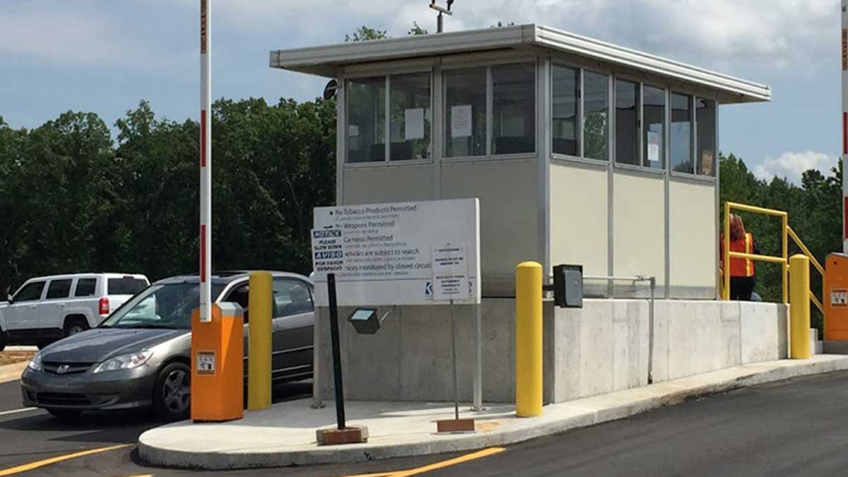 Custom designed guard shack with windows for industrial site entry monitoring