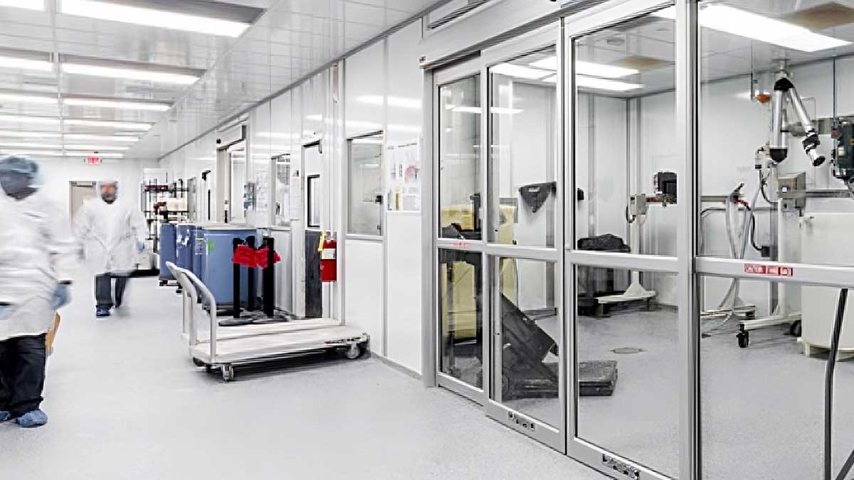Pharmaceutical lab cleanroom with glass sliding doors and pass-through port