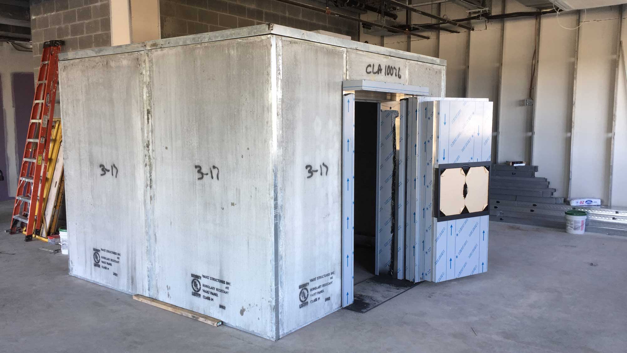 concrete vault panels assembled on-site to form a secure storage vault interior