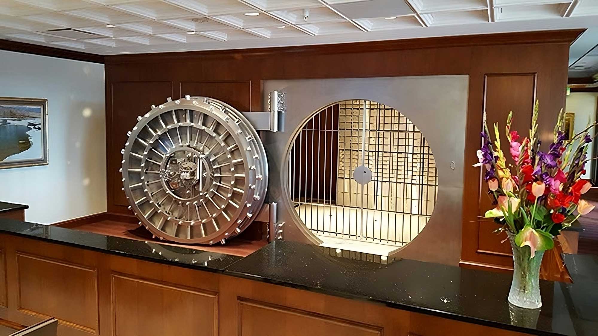 modular vault door integrated into reception area for secure financial storage