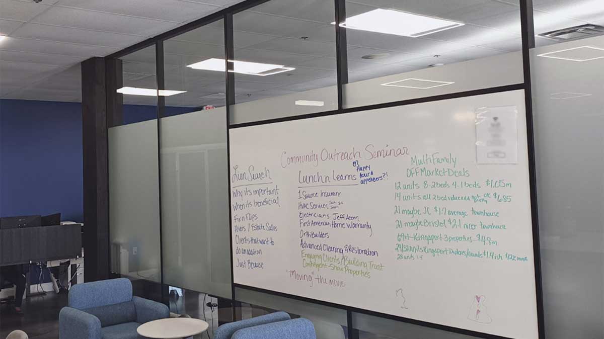 Glass moveable wall partition with modern framing