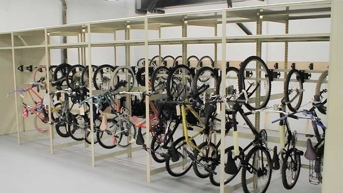 horizontal overhead bike storage rack bank maximizing floor space by suspending multiple bicycles