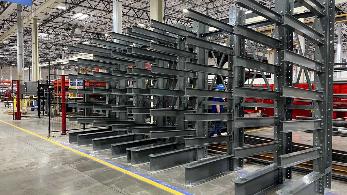 Cantilever racks holding pipes and long materials in a water supply warehouse