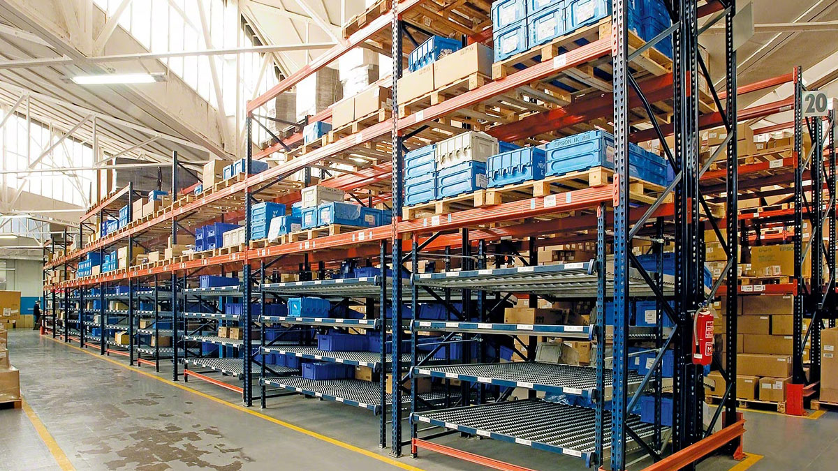 Gravity flow racks installed in a high-density warehouse for organized inventory and space saving