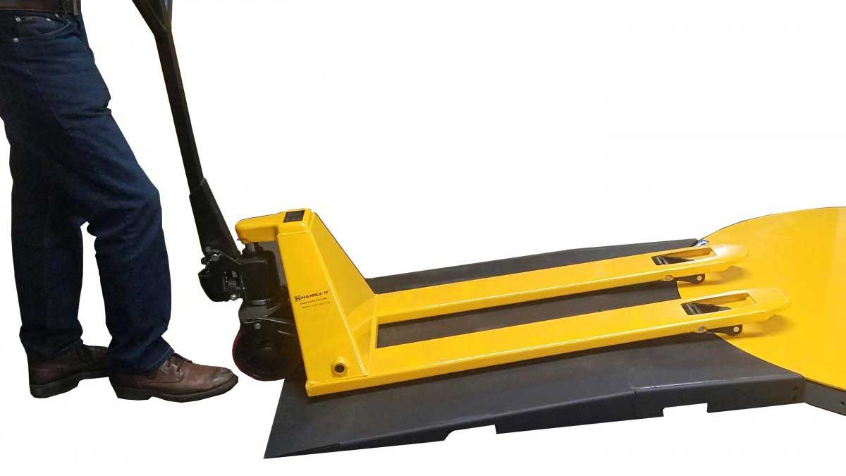 Low-profile turntable pallet wrapper with ramp access at military depot