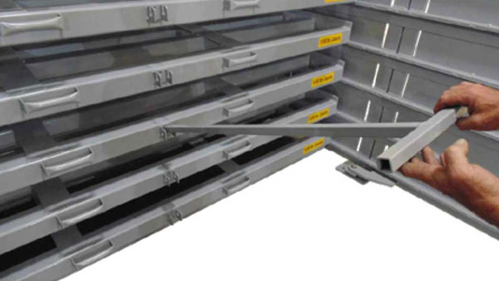 Pull-out shelf on sheet metal rack for quick access to stored materials