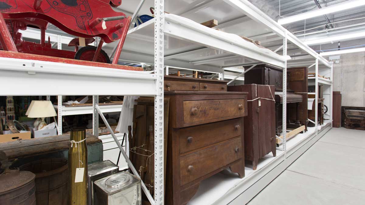 wide span shelving system in museum for storing collection items and optimizing space 