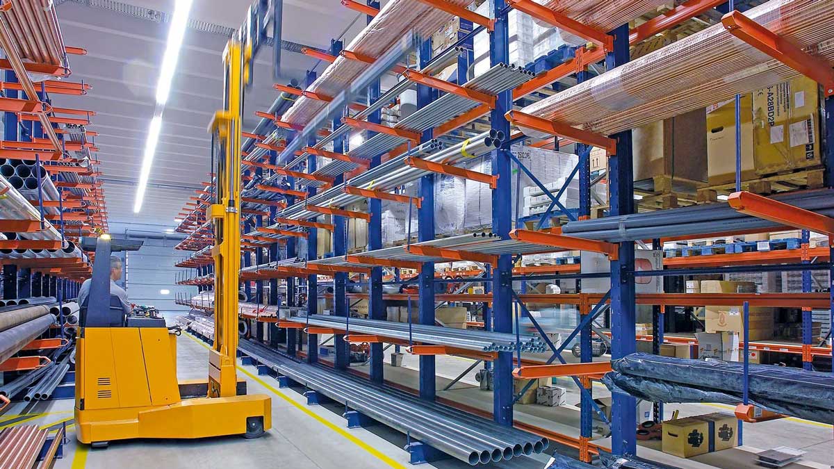 Cantilever racking storing long pipe in an industrial warehouse
