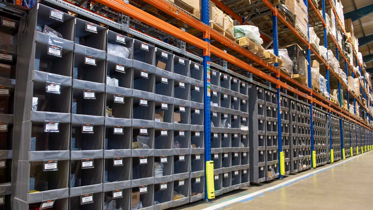 warehouse bins storing spare parts for streamlined inventory organization and quick access
