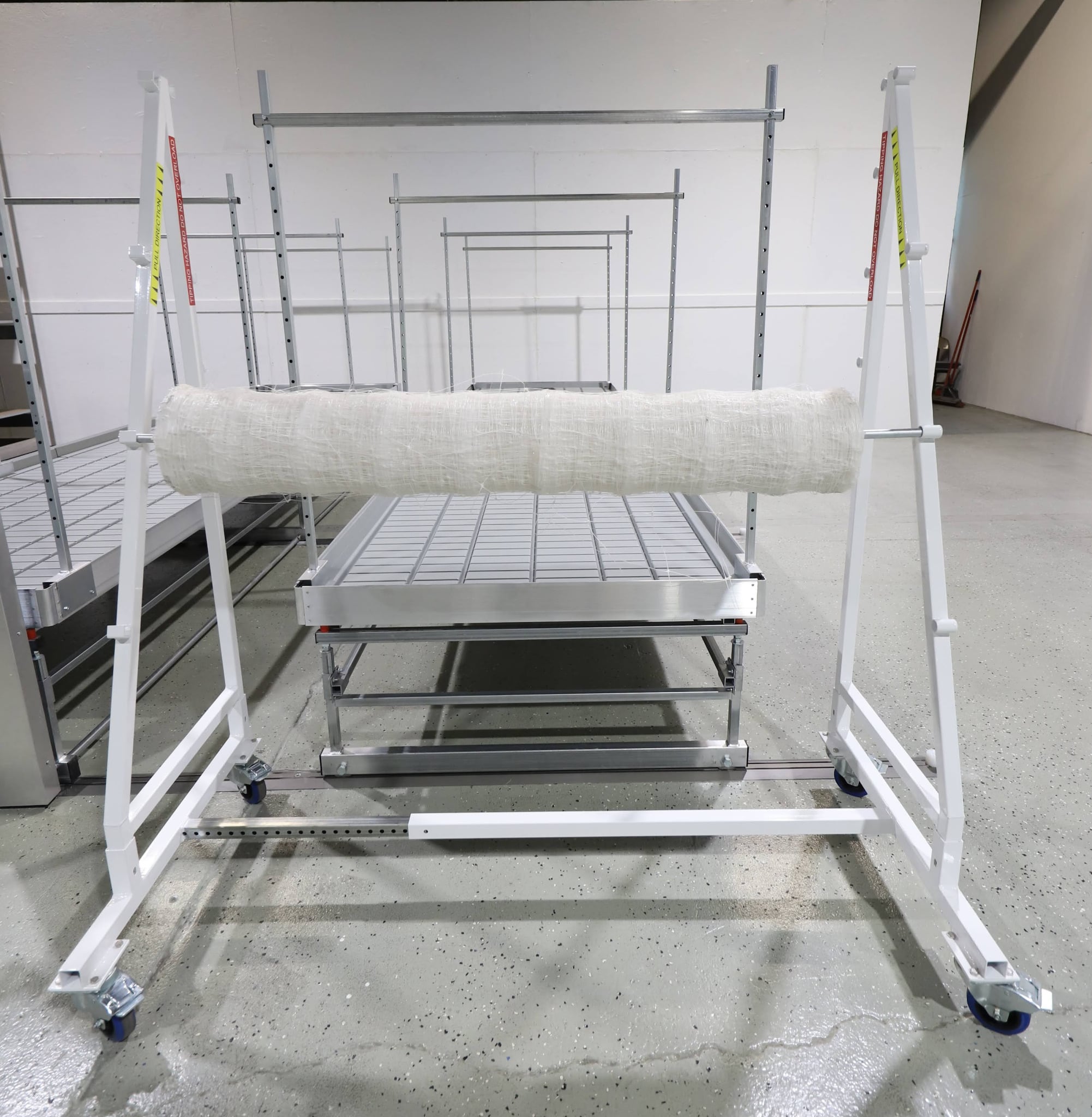 Trellis dispenser cart with netting roll
