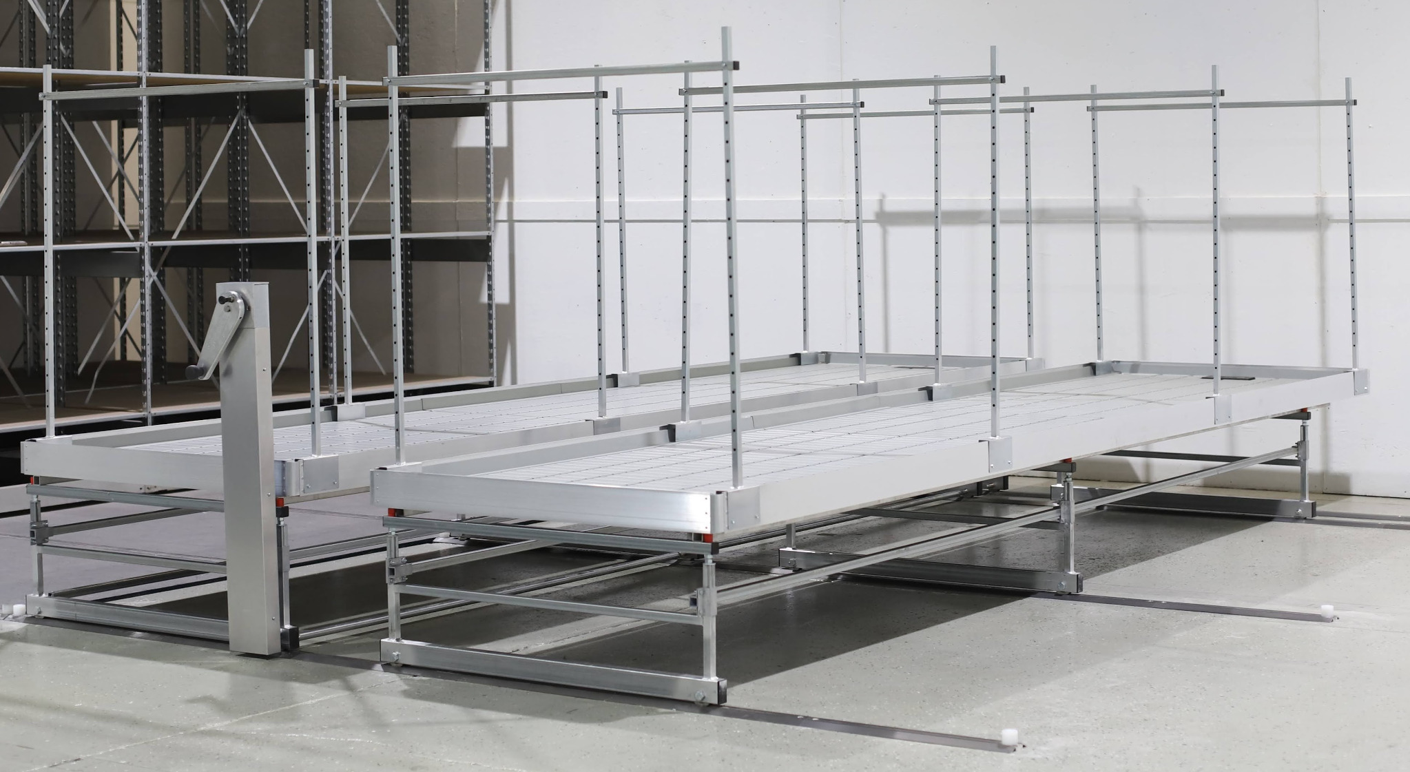 Mobile platform bench system creates movable work surfaces for inventory storage and staging