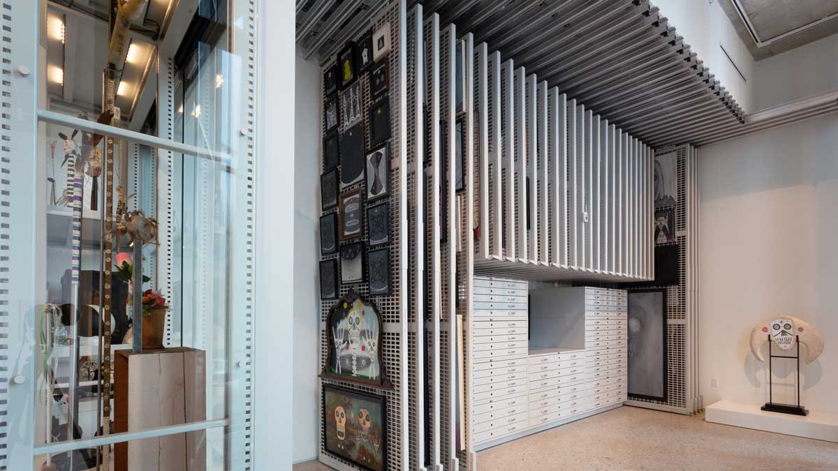 Mobile flat file drawers and vertical shelves storing artwork