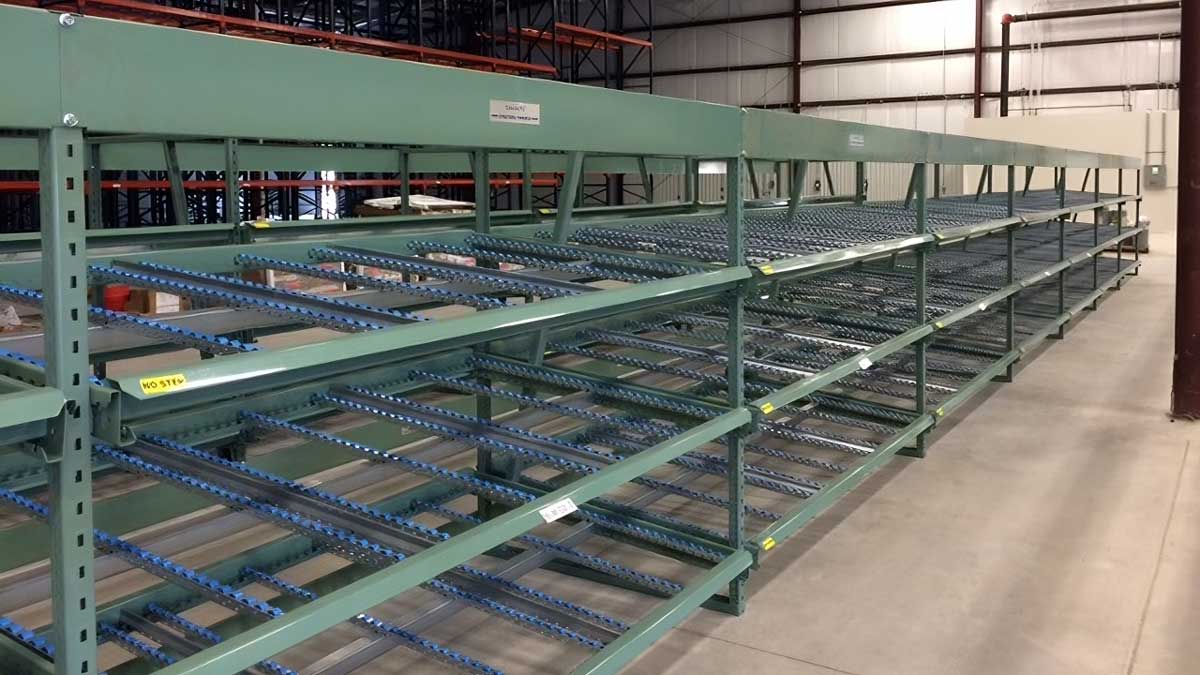green gravity flow bin racks with steel rollers for carton first in storage