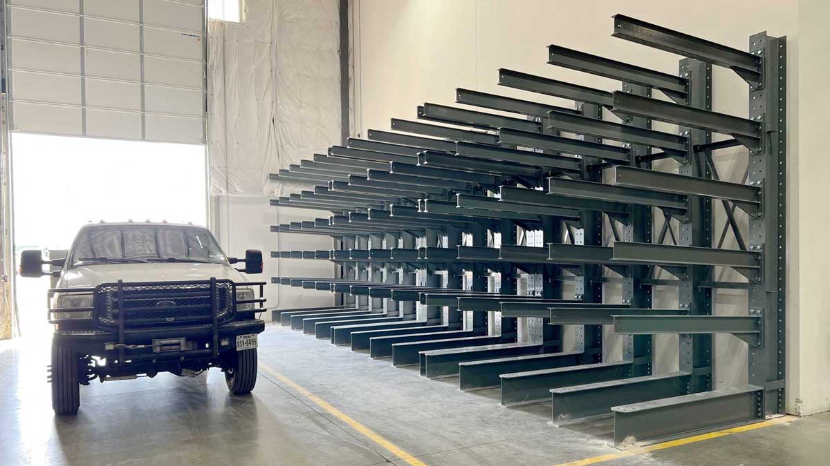 gray wall mounted cantilever rack system with arms for storing long materials