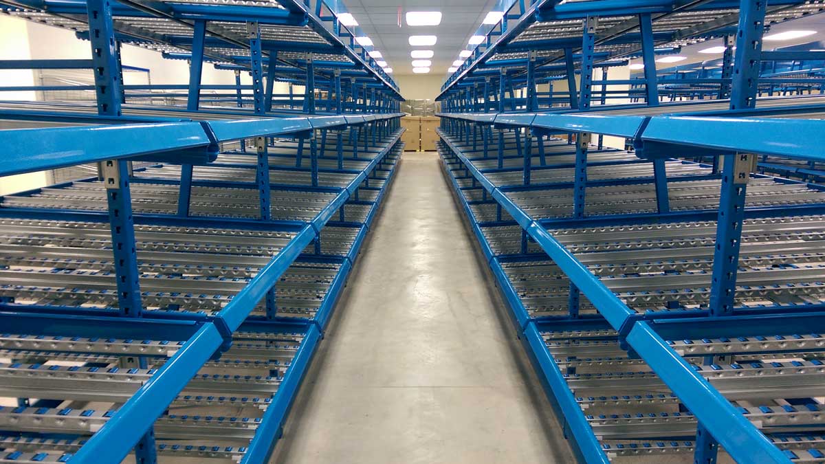 blue carton flow shelving rows with roller tracks for warehouse picking