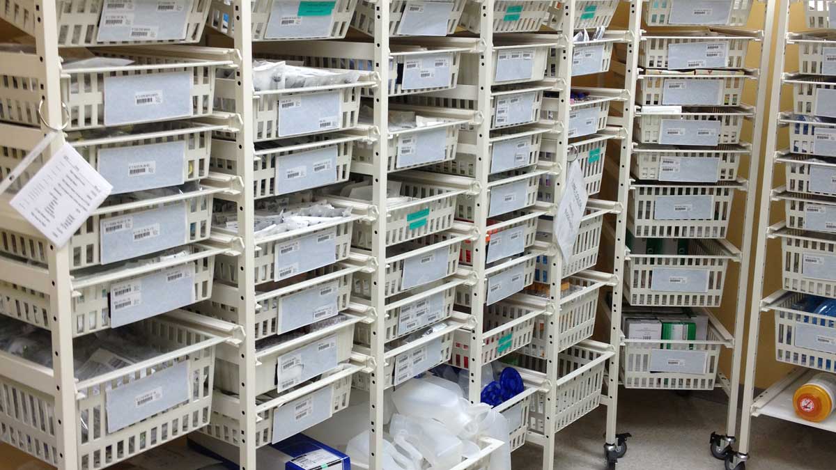 two-bin kanban rack with removable supply baskets organizing medical inventory in supply room