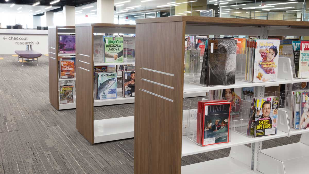 Flexible library shelving displaying magazines in county system