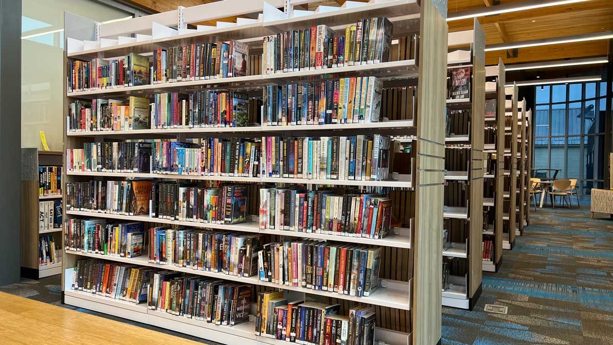 Library shelving units for organizing and displaying books in a clean layout