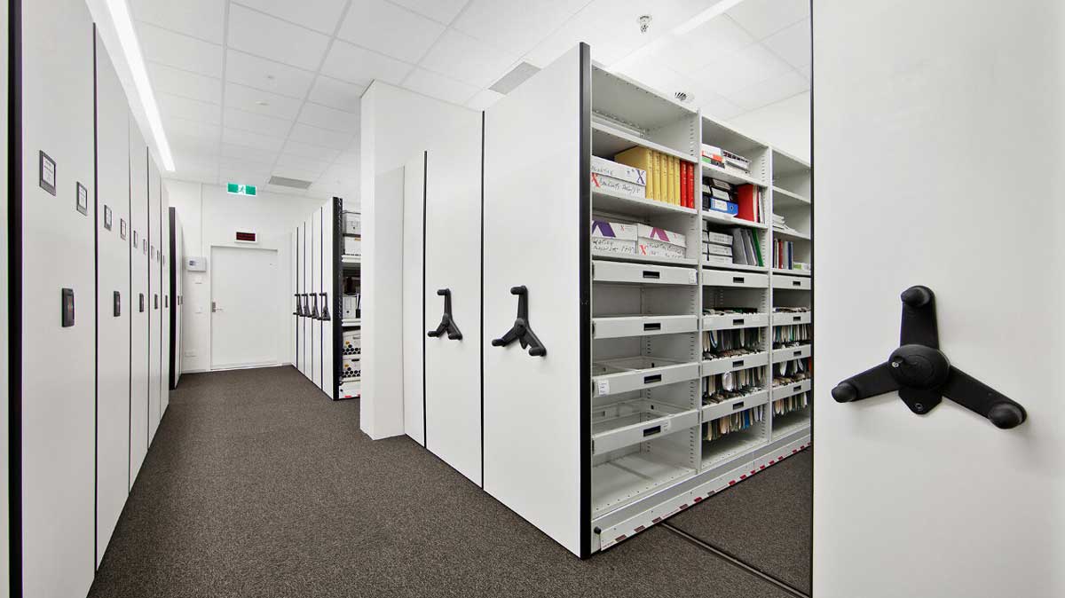 high-density compact shelving unit with hand crank for organized office file storage
