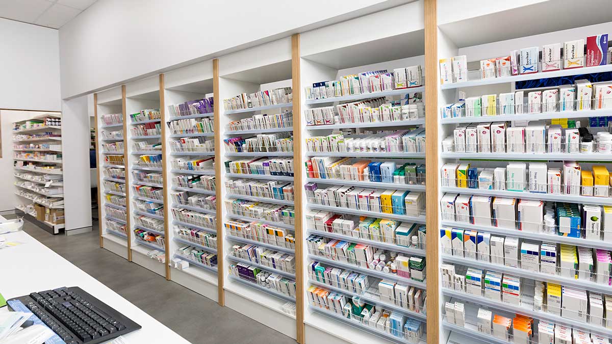 sloped pharmacy shelving for improved visibility and access to medications