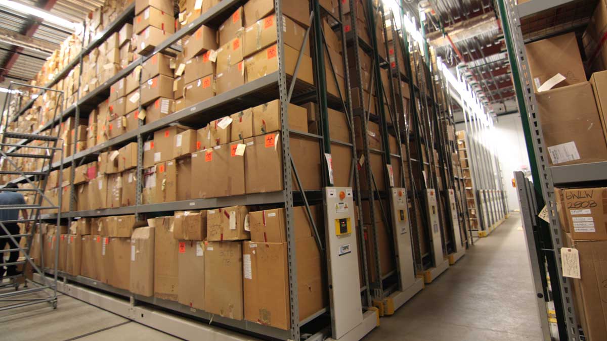 Powered mobile shelving storing AV and archive boxes