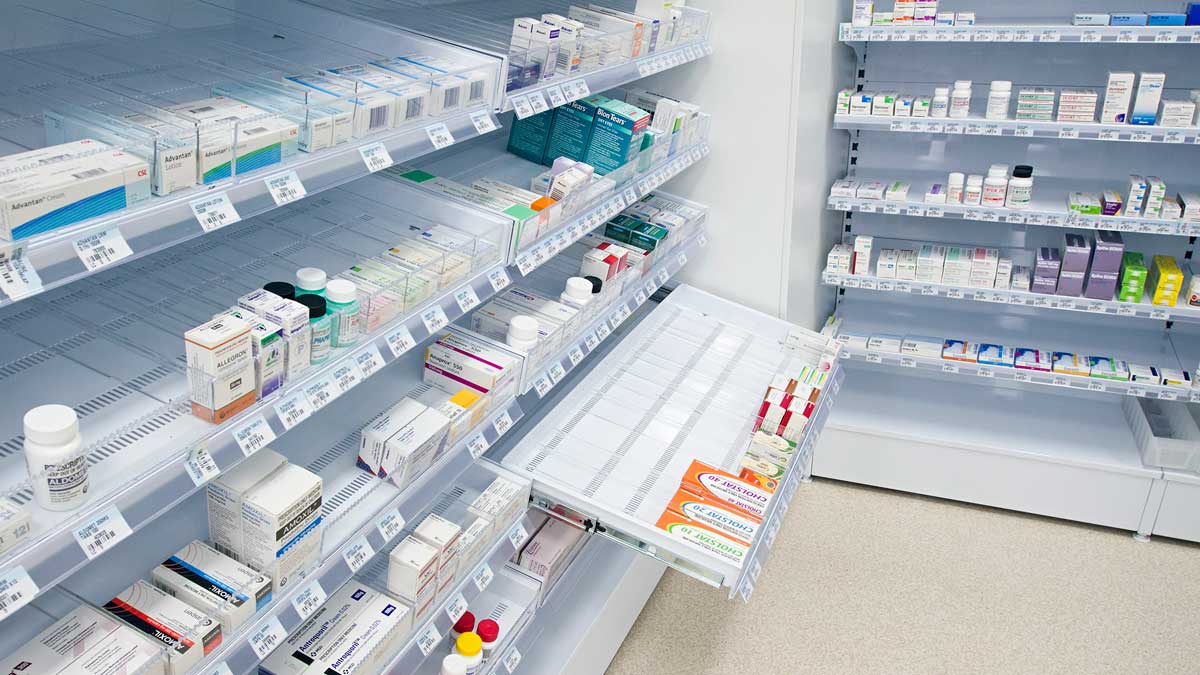pharmacy shelving with gravity feed design for easy medication access and inventory management