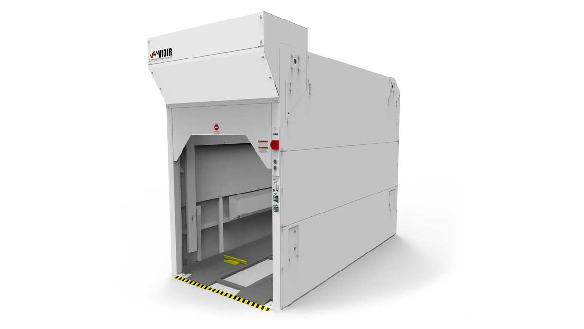vertical bed storage lift with platform lowered for loading hospital bed