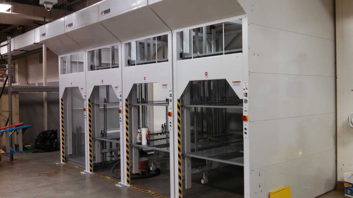 vertical bed lifts storing beds to maximize storage space in healthcare facilities