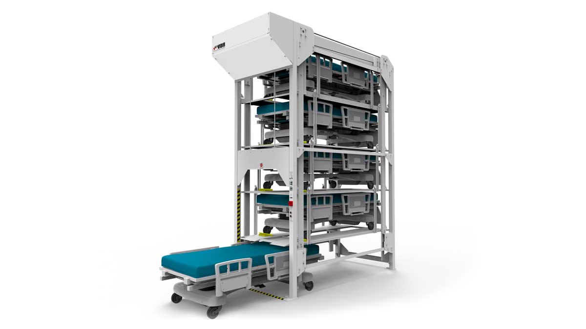 vertical lift storing multiple hospital beds to optimize storage space