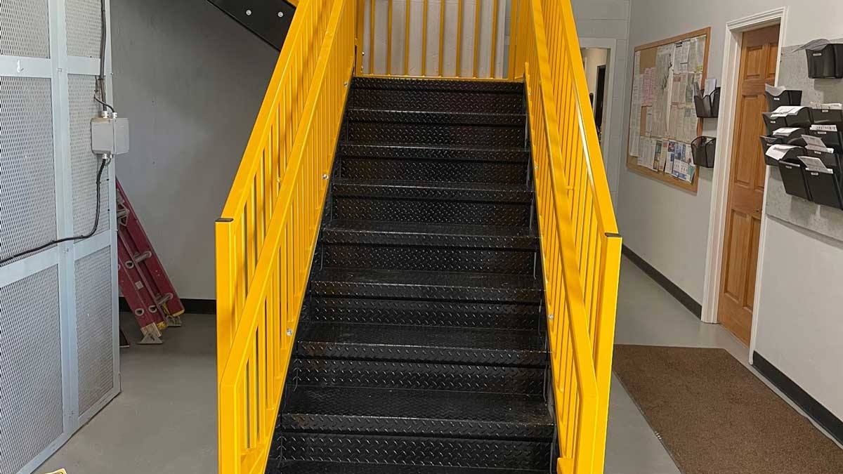 mezzanine stairs and platform with mesh grating flooring for ventilation and slip resistance