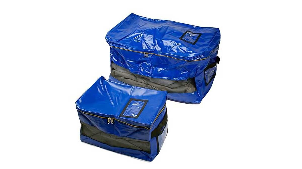 zippered storage bags with mesh windows for organized transport and storage of folded garments in laundry operations