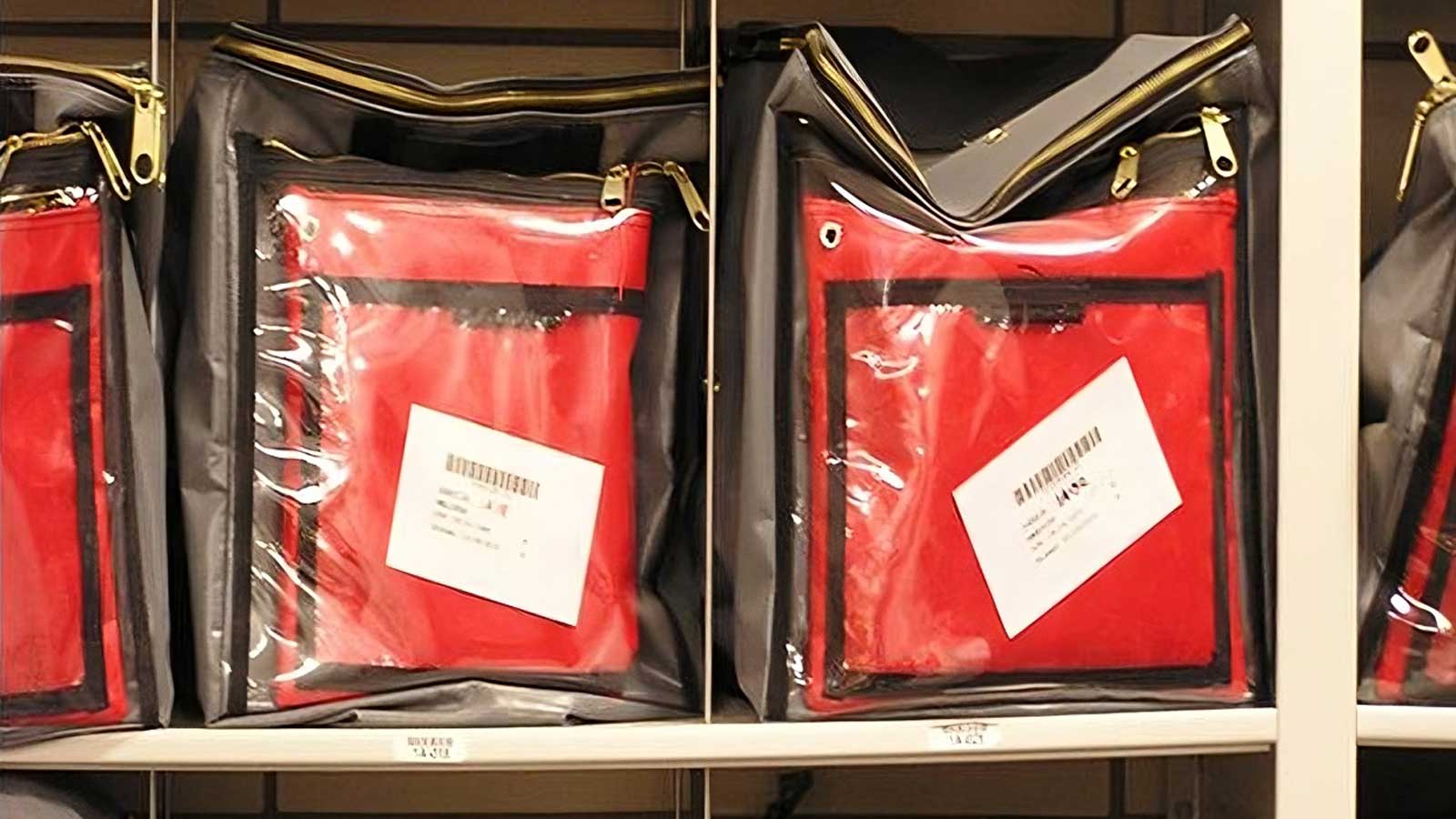 zip-closure property bag holding inmate belongings on shelves for property management 