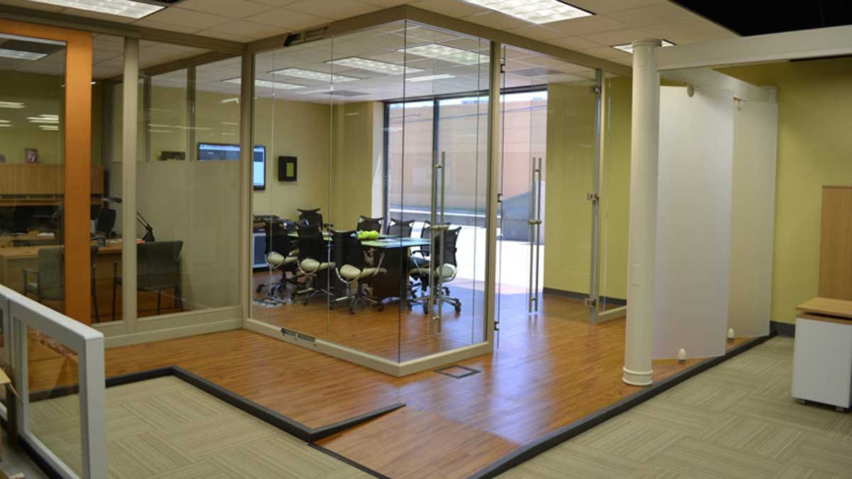 Finished workspace with concealed underfloor cable routing