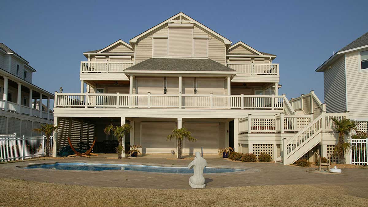 roll-down hurricane shutters protect windows and doors from storm damage in homes