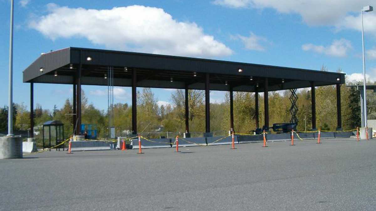 Solar canopy covering an industrial loading area