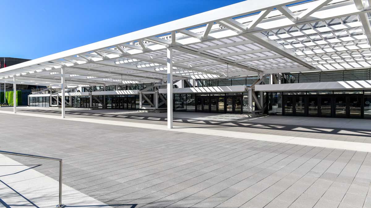 steel canopy installed at conference center entrance providing covered pedestrian walkway