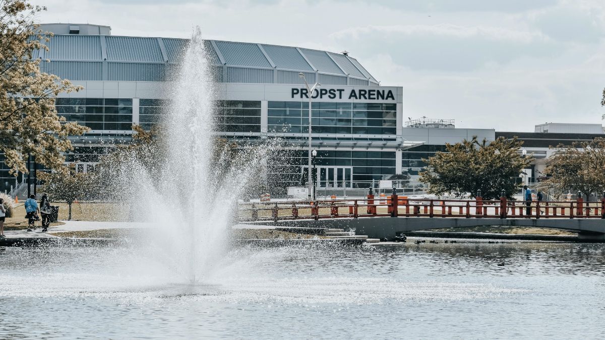 Arena waterfront public space Alabama with fountain and pedestrian area