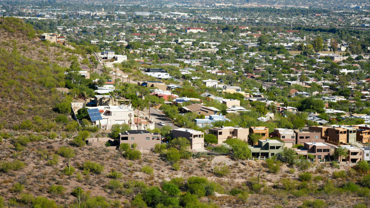Desert hillside neighborhood Yuma with homes and low desert landscape