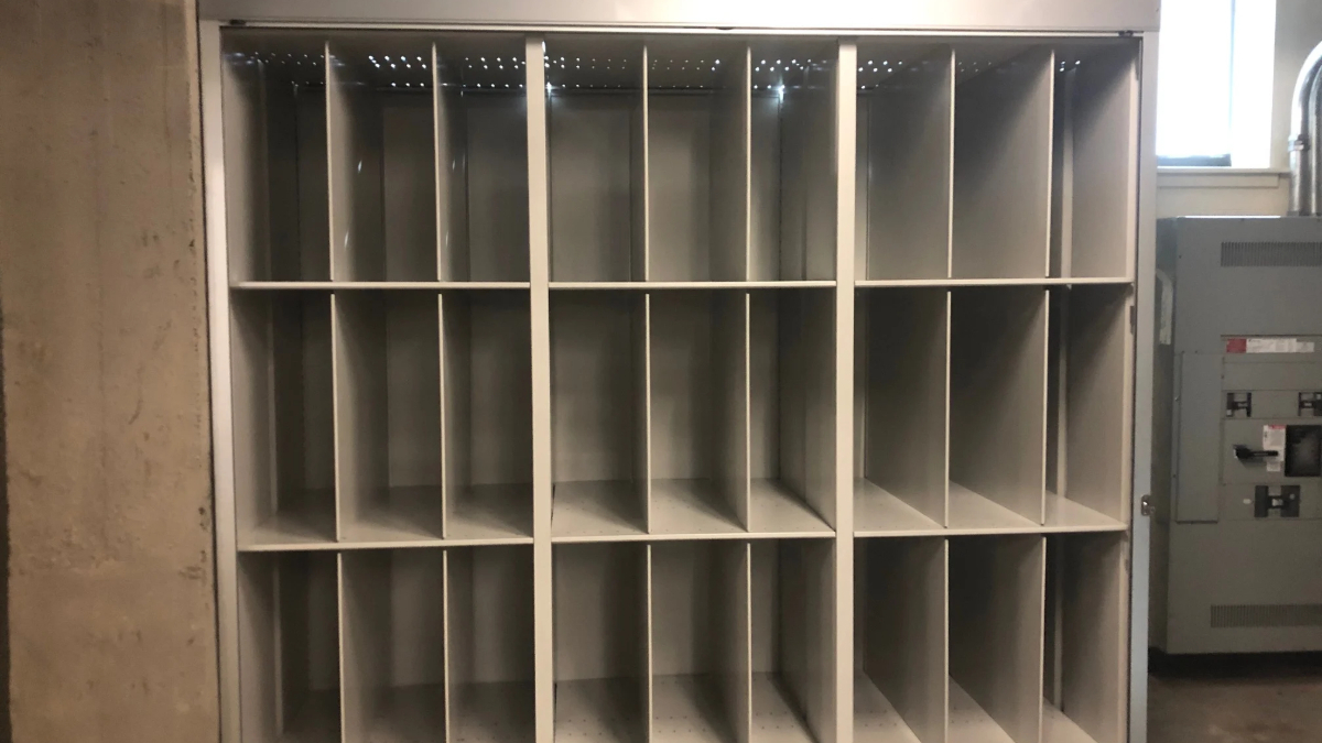 Library art storage cabinet with divided shelving for oversized materials