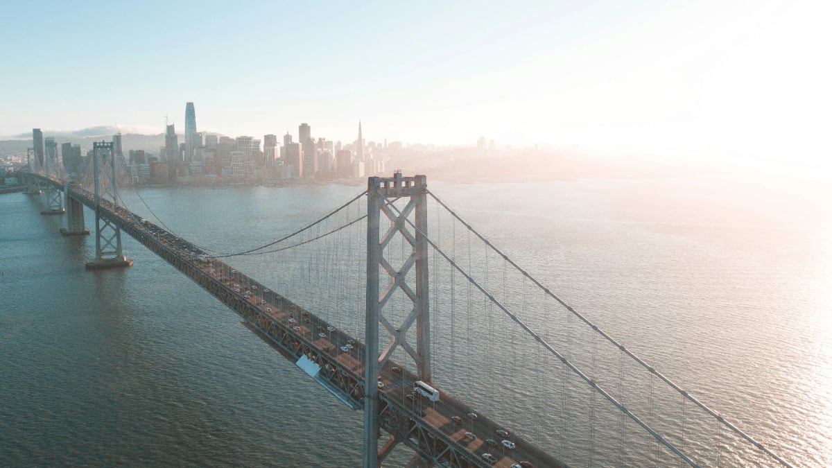 Bay bridge view San Francisco with suspension span and skyline in the distance