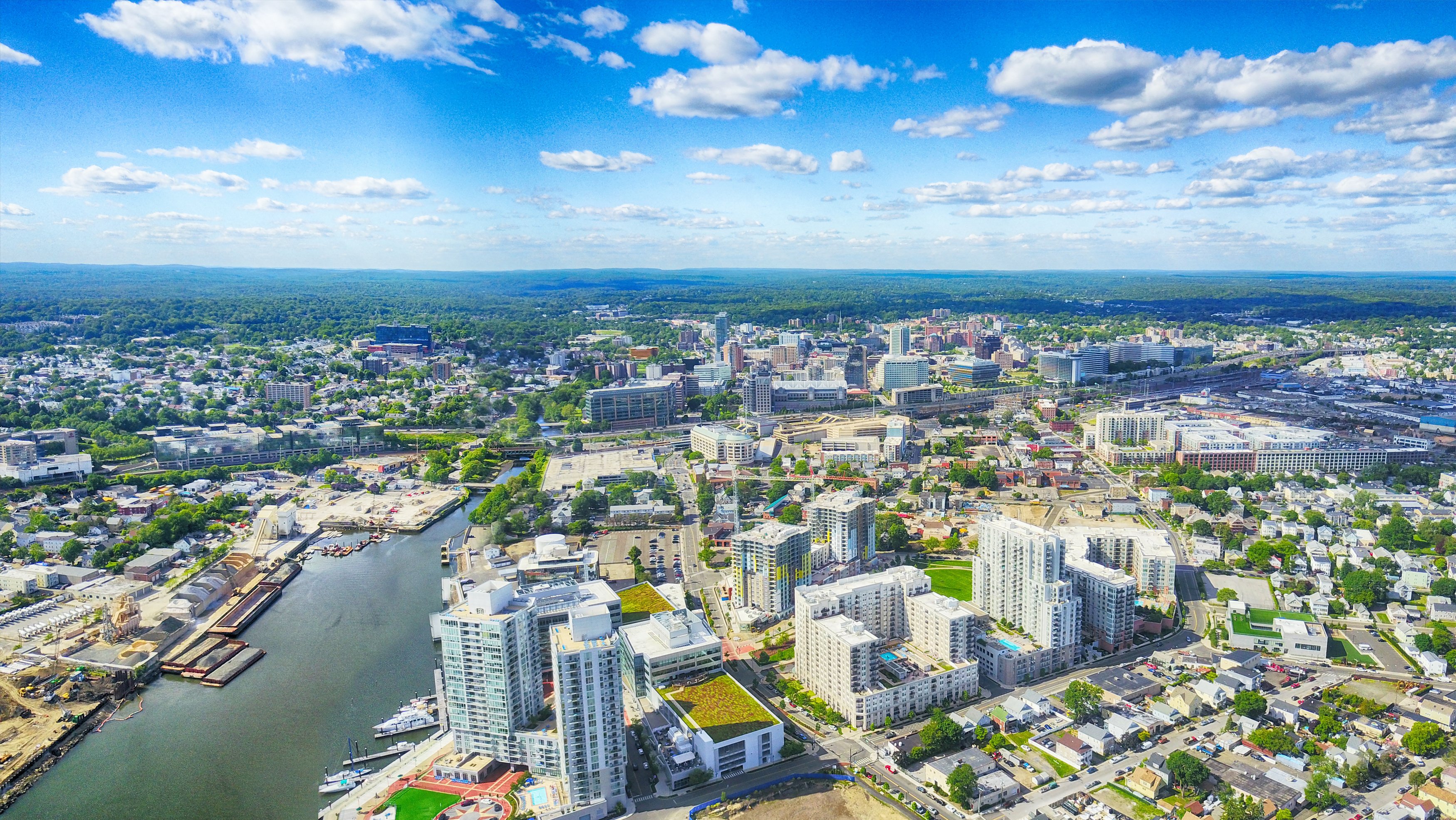 Waterfront aerial view Stamford with downtown buildings residential blocks and harbor