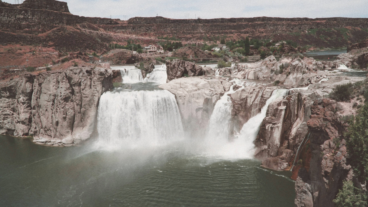 Waterfall canyon view Twin Falls with rocky cliffs and flowing river