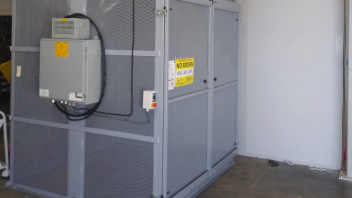 Secure material lift enclosure for protected vertical transport and controlled access