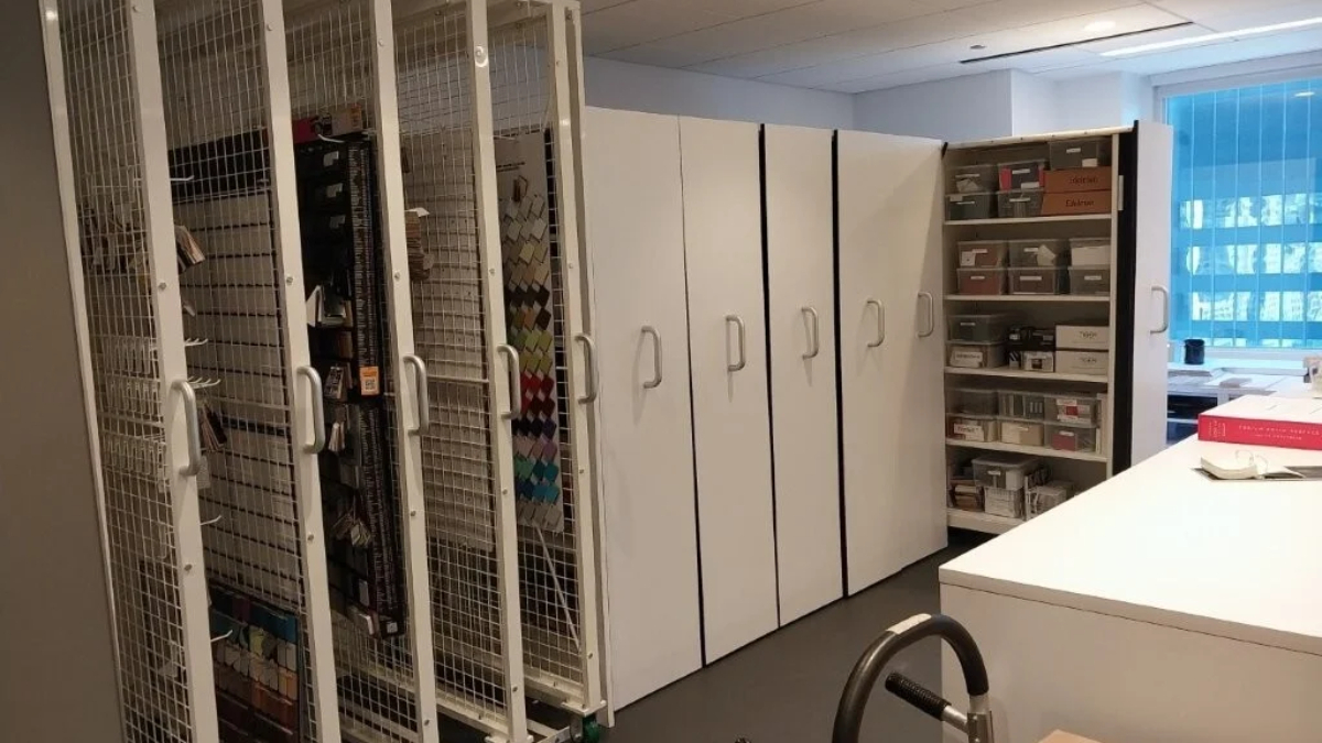 High density office storage system with mobile shelving for organized files and supplies